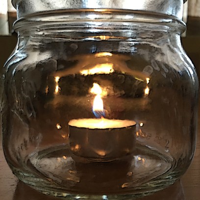 candle in jar